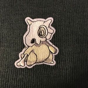Gray Pokémon Cubone patch beanie